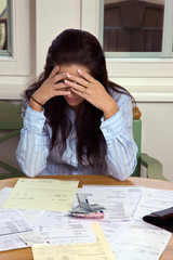 Woman with unpaid bills