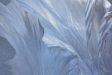 Frosty natural pattern on winter window