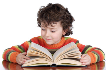 Adorable happy boy studying