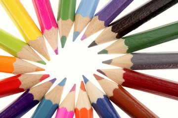 Colored pencils on white background