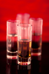 Shot glasses lined up ready to drink
