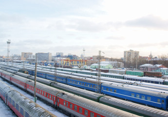 Fototapeta na wymiar wagons under snow on winter cargo terminal