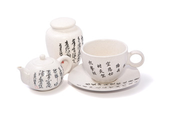 Tea-things in asian style with hieroglyphics. Path incl.