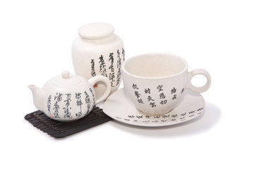 Tea-things in asian style with hieroglyphics. Path incl.