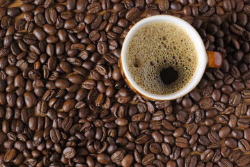 Coffee beans and cup