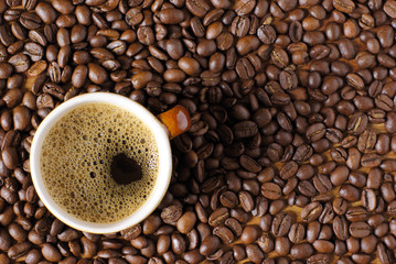 Coffee beans and cup