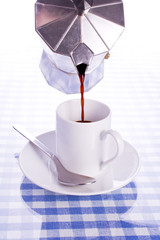 pouring espresso