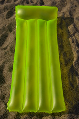 airbed lying on a sand