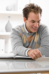 Young man working at home