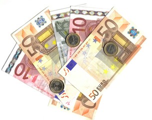 euro coins and banknotes isolated over white