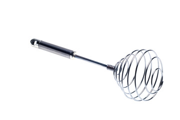 silver whisk over a white background