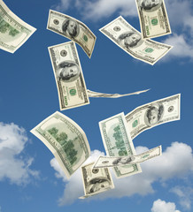 hundred dollar banknotes falling