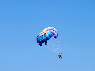 Couple parasailing
