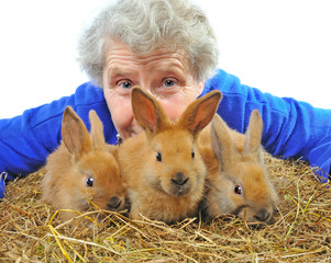elderly woman near rabbit