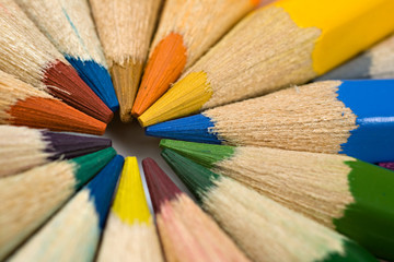 Color pencils in arrange in color wheel colors