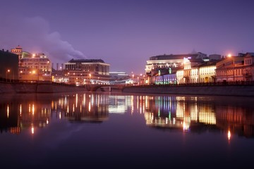 Fototapeta na wymiar City reflection in the river at night