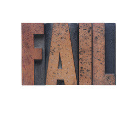 the word 'fail' in old ink-stained wood type