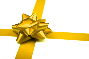 Yellow holiday bow on white background