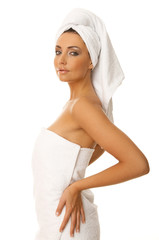 Portrait of 20-25 years old beautiful woman wearing towel