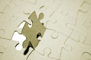 Fototapeta premium Final piece to complete jigsaw puzzle