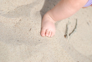 foot on sea sand