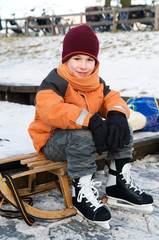 Little boy on a sled