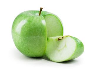 Green apple with slice on white