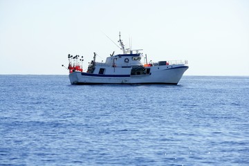 Fototapeta na wymiar Mediterranean longliner boat working in Alicante