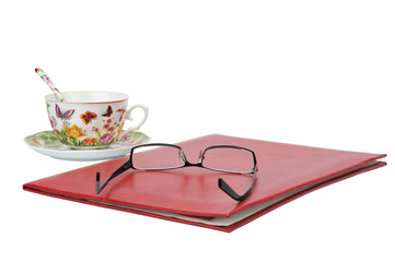 glasses lie on folder