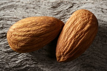 Almond macro over wood background