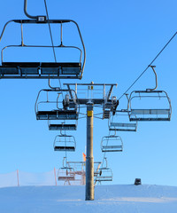 Ski lift against a blue sky