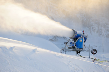 Snow cannon making snow at ski resort