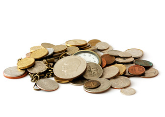 Pocket watch among coins isolated on white