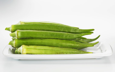shot of lady finger on the white background