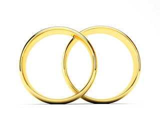 Wedding golden rings one over another. Isolated