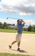 Senior golfer playing golf