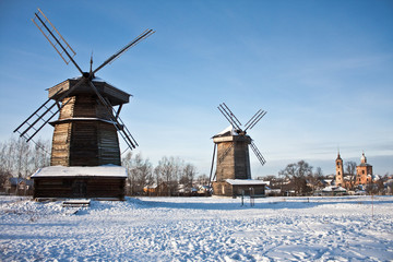two windmills and church