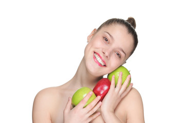 Beautiful young woman holding apples