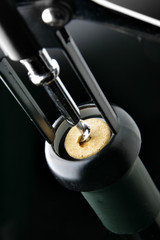 Opening wine bottle