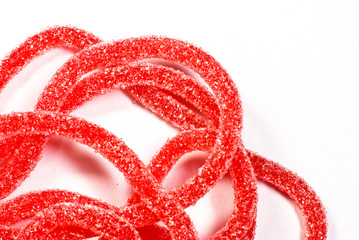 Red candy on white background