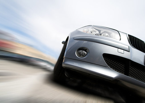 Fototapeta Fast car moving with motion blur