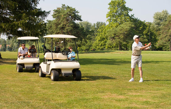 Family Playing Golf