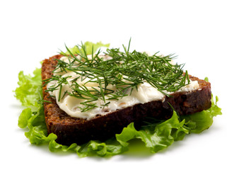 Sandwich with cheese and aromatic herbs.