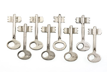 set of old keys isolated on white background