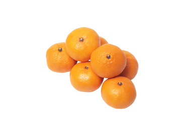 Pile of tangerines isolated on white.