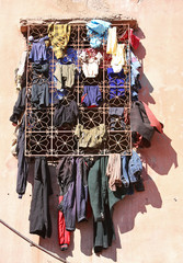 Fototapeta na wymiar Window with washing hung for drying