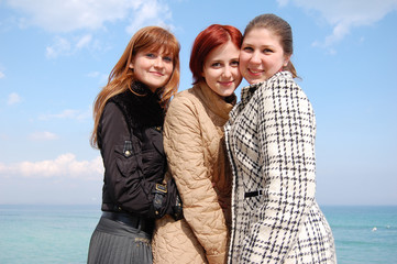 Three smiling beauty girls