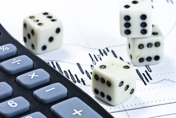 calculator and cubes on business background