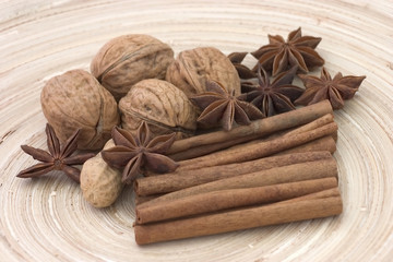 Fototapeta na wymiar nuts, cinnamon and anise