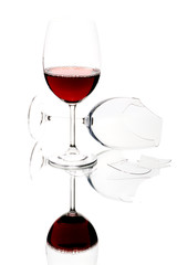 Glass of red wine isolated on white